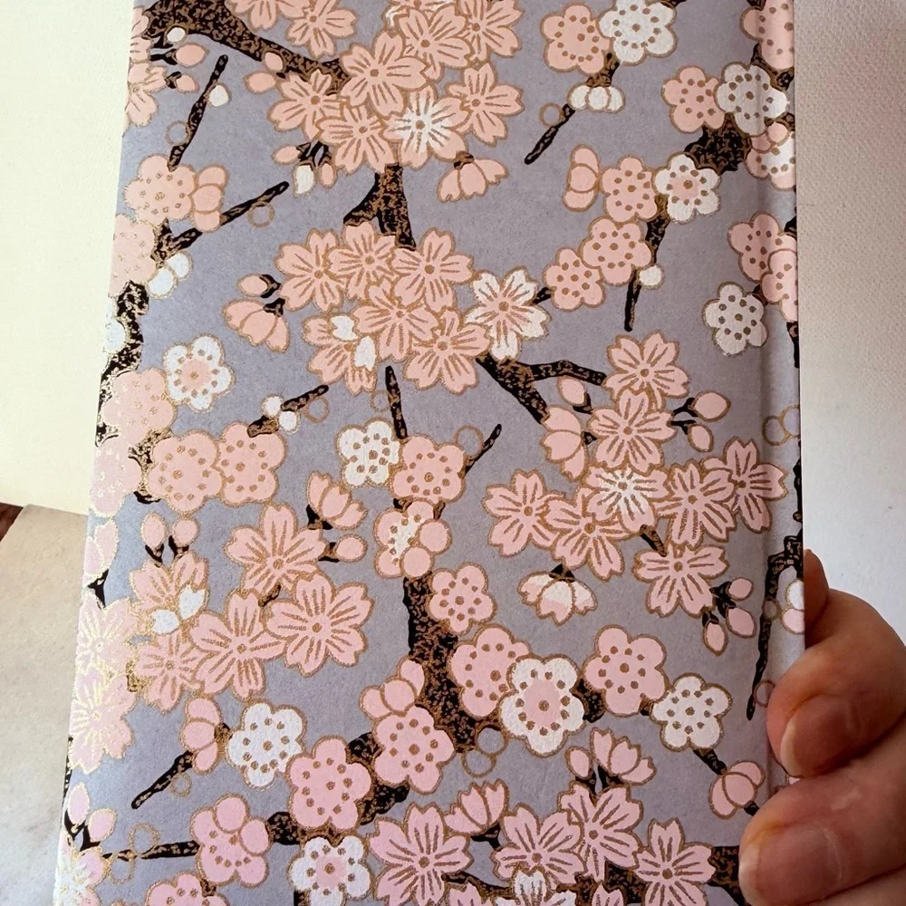 Japanese  notebook or journal featuring a cherry blossom (Sakura) pattern